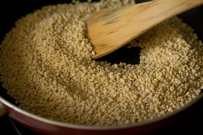 stirring and roasting urad dal. 