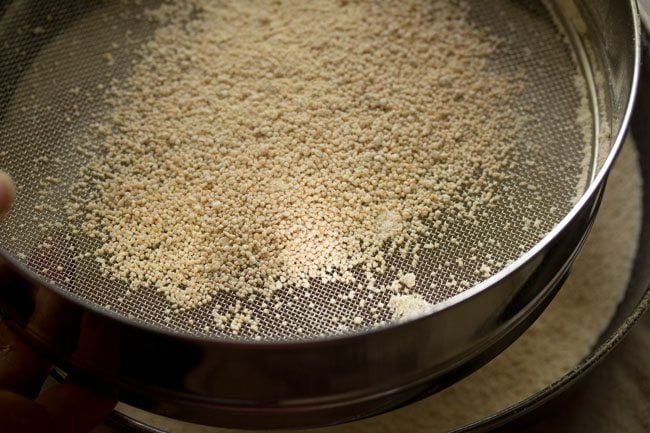 urad dal grits remaining in the sieve. 
