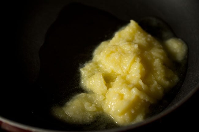 melting ghee in a pan. 