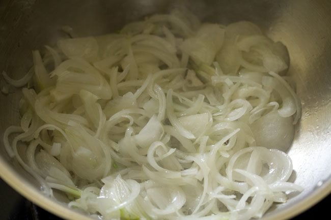 sautéing onions in the kadai. 