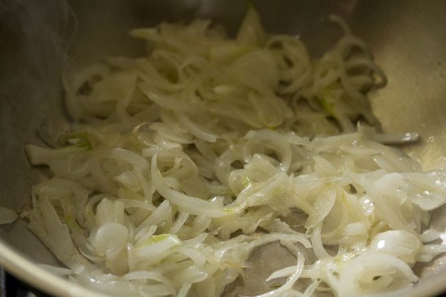 sautéing onions in the kadai. 