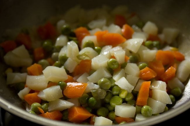 steamed vegetables added in the kadai. 