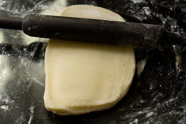 rolling the puff pastry dough. 