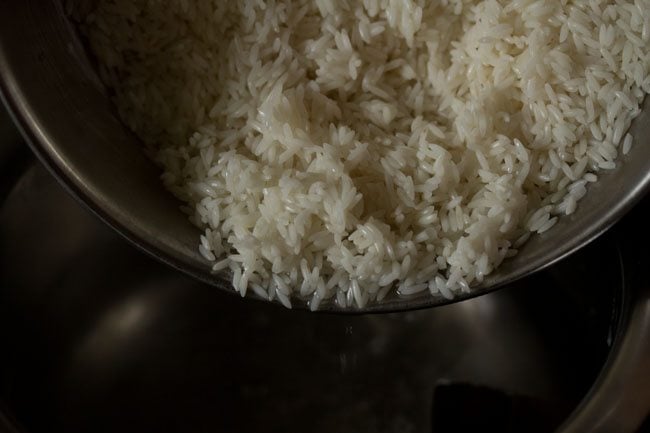 soaked rice added to hot water