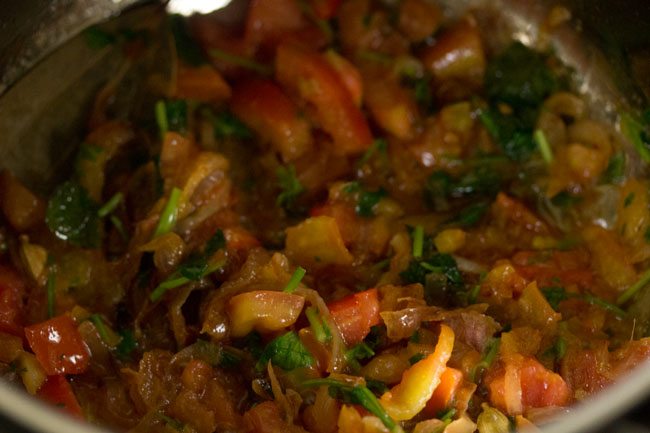 mixing mint and coriander leaves with mixture