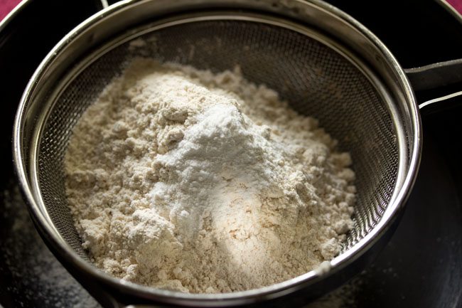flour and baking powder in a sieve