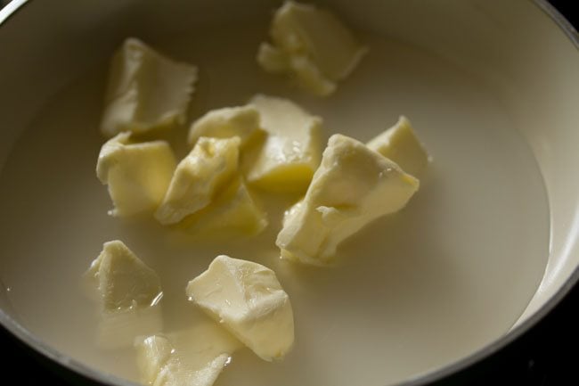 chopped butter cubes and water in a pan