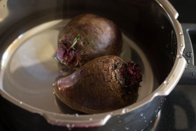 beetroot with water in a pressure cooker