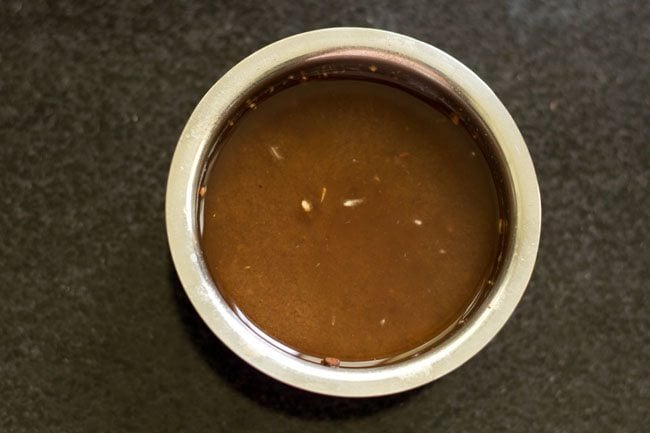 tamarind pulp in a bowl for bendakaya curry. 