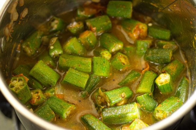making Andhra style bendkaya pulusu recipe