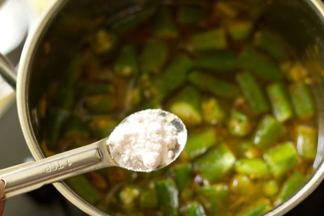 making Andhra style bendkaya pulusu recipe