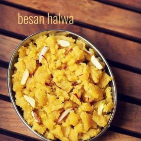 besan ka halwa garnished with saffron strands, almond slivers and served in a plate with text layover.