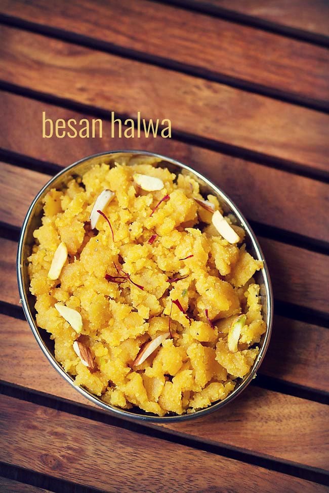 besan ka halwa garnished with saffron strands, almond slivers and served in a plate with text layover.