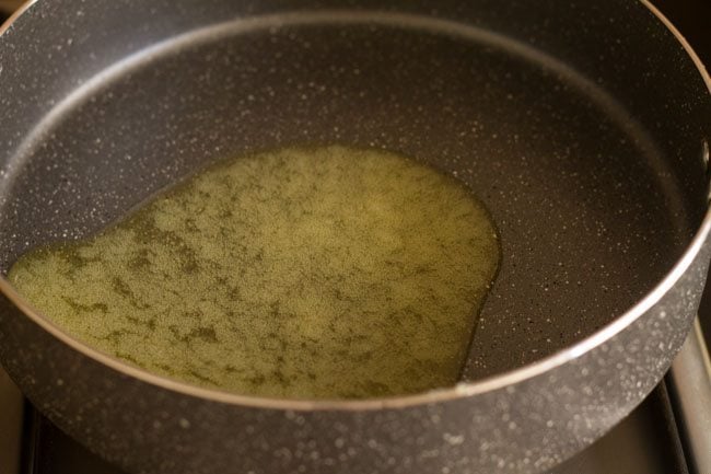 melting ghee in a pan