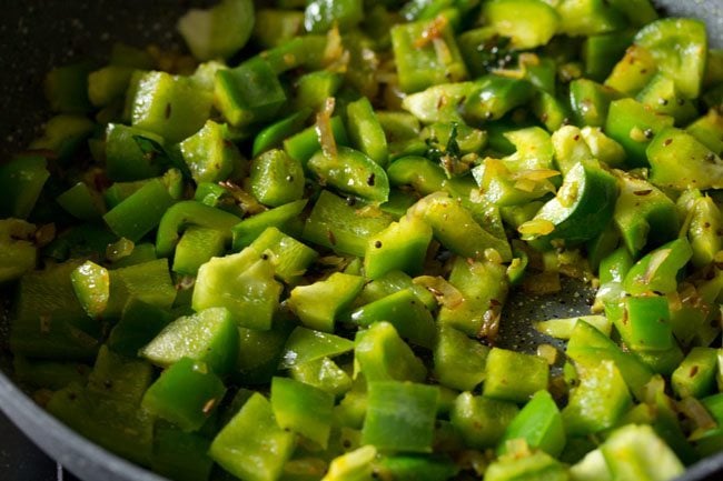 mixing capsicum with rest of ingredients