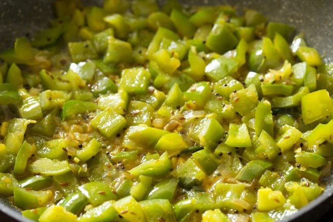 cooking capsicum in the pan