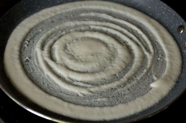 cooking dosa on medium heat. 