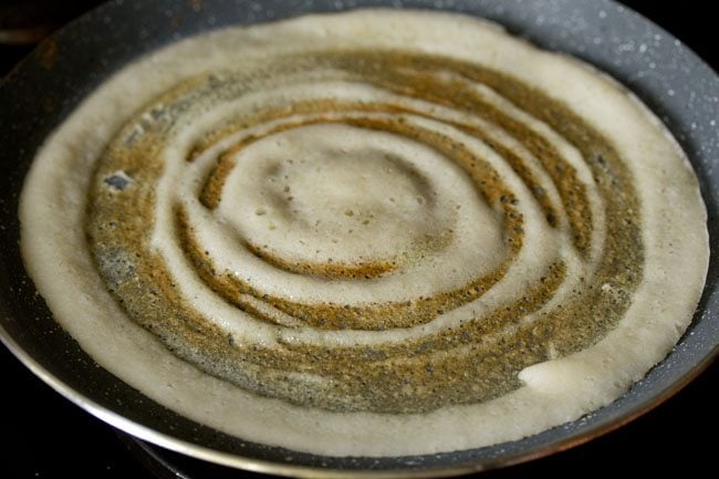 base of the dosa becoming golden. 