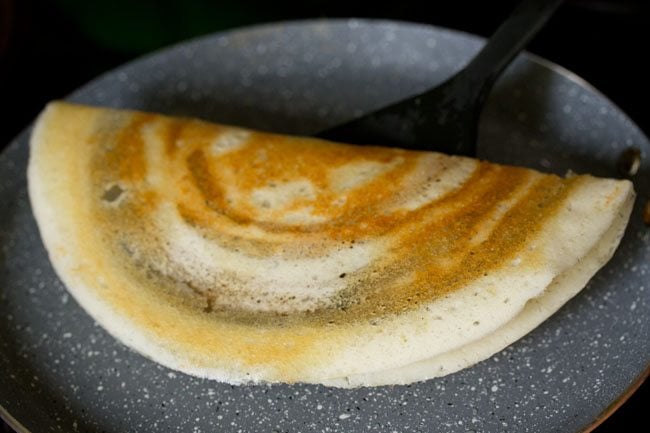 ghee roast dosa folded. 