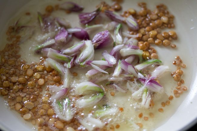 sliced pearl onions added to the pan. 