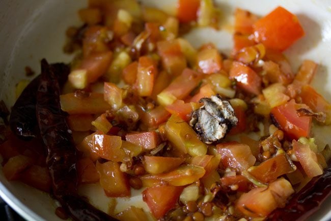 tamarind added to tomato mixture. 