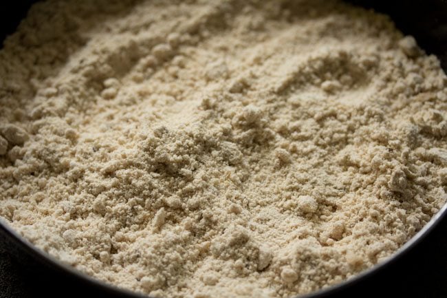 Rub the ghee into the flour mixture to get a breadcrumb texture.