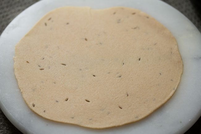 Roll the dough into regular size pancakes.