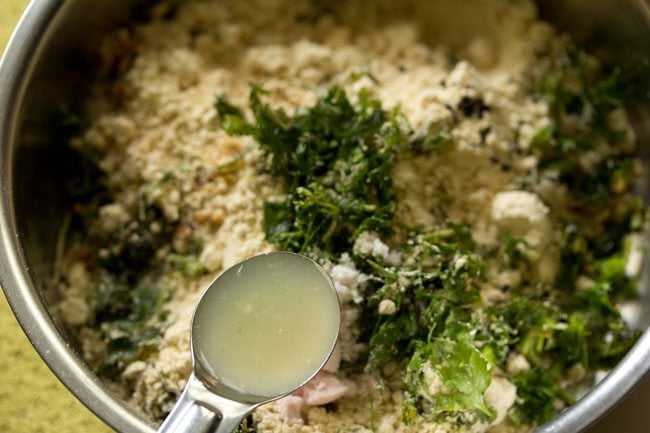 adding lemon juice to the bowl. 