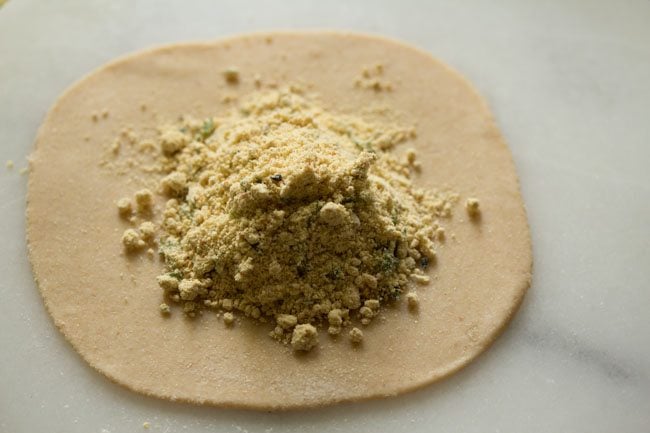 stuffing mixture placed in the center of the rolled disc. 