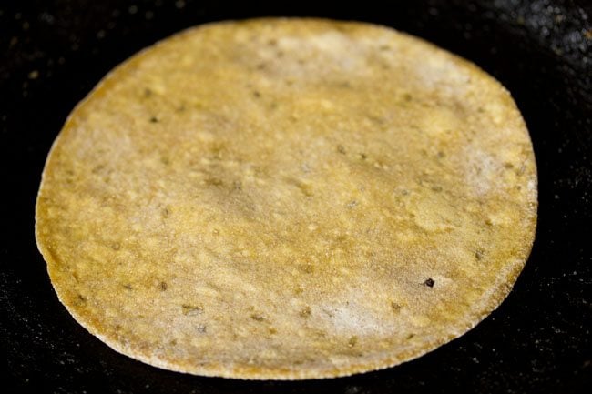 frying paratha on tawa