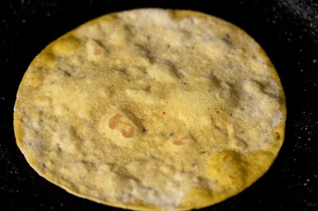 frying paratha on tawa