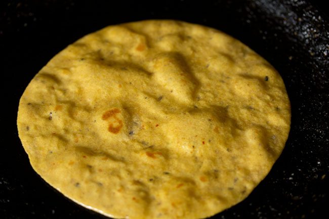 frying paratha on tawa