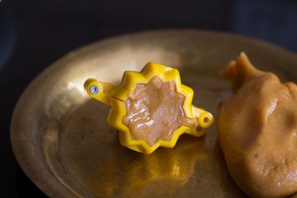 mawa ball pressed into the modak mould. 