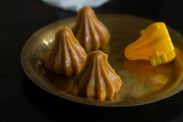 prepared mawa modak on a thali. 