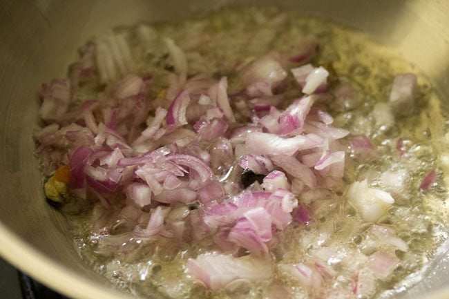 chopped onions added to pan