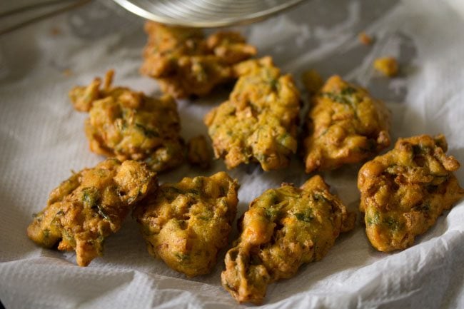 fried veggie pakora on kitchen paper towels