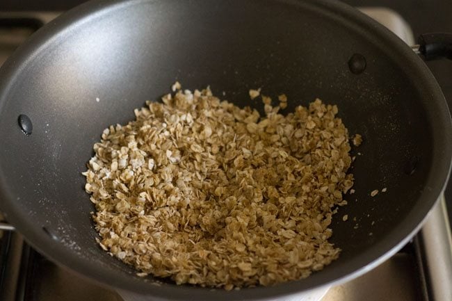 sautéing oats in hot ghee. 