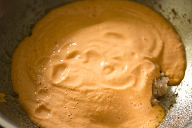 creamy tomato cashew sauce added to pan