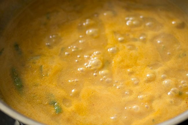 simmering the cottage cheese curry gravy