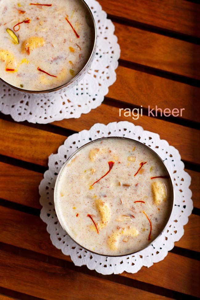 top shot of ragi kheer served in bowls kept on a wooden table with text layovers.