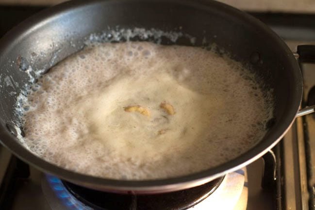 ragi kheer bubbling in the pan. 