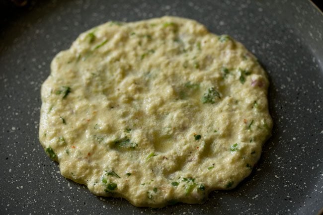 cooking suji ka cheela on low heat. 