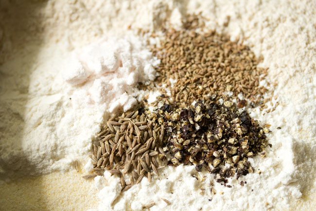flour and spices to make savory shankarpali 