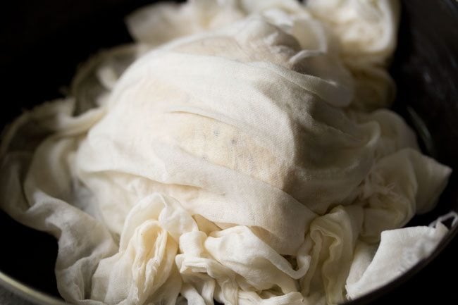 dough for making namkeen shankarpali covered with a cloth