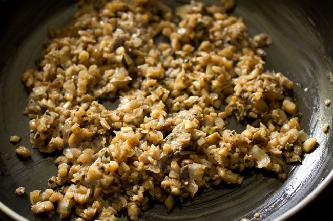 mushroom stuffing in pan for baked stuffed mushrooms.