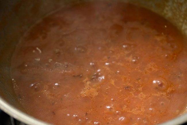 simmering the tomato mixture. 