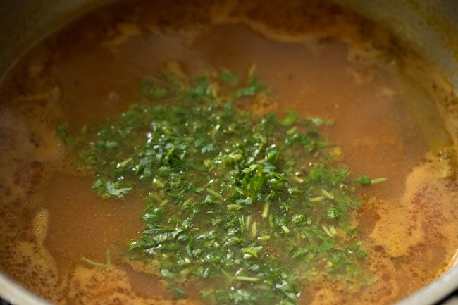 chopped coriander leaves added to the shorba. 