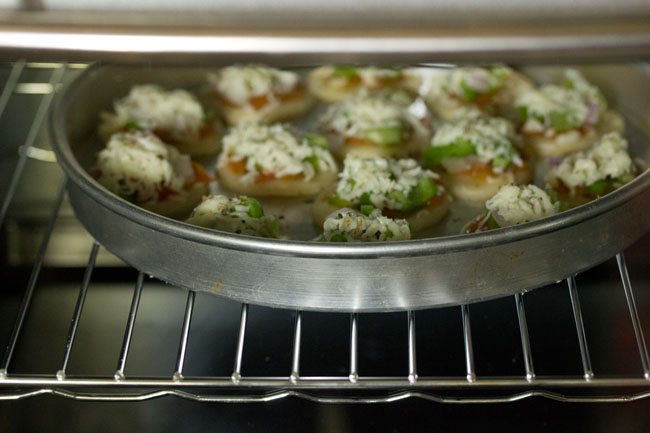 baking veg pizza puffs.