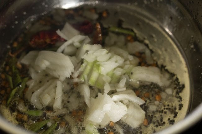 chopped onions added to the pan. 