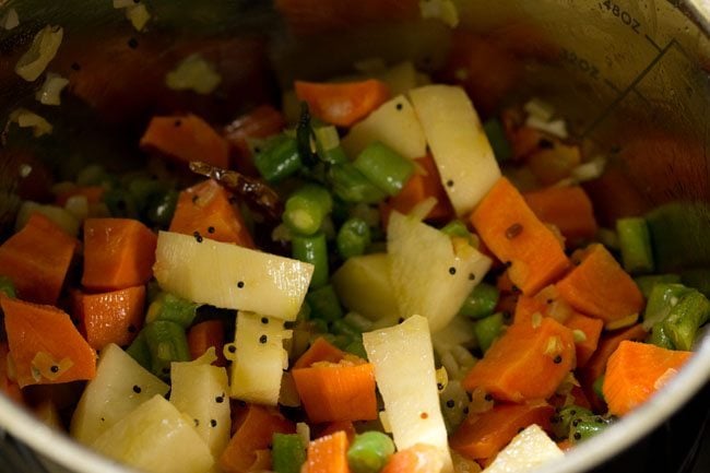 vegetables mixed well with the onion mixture. 